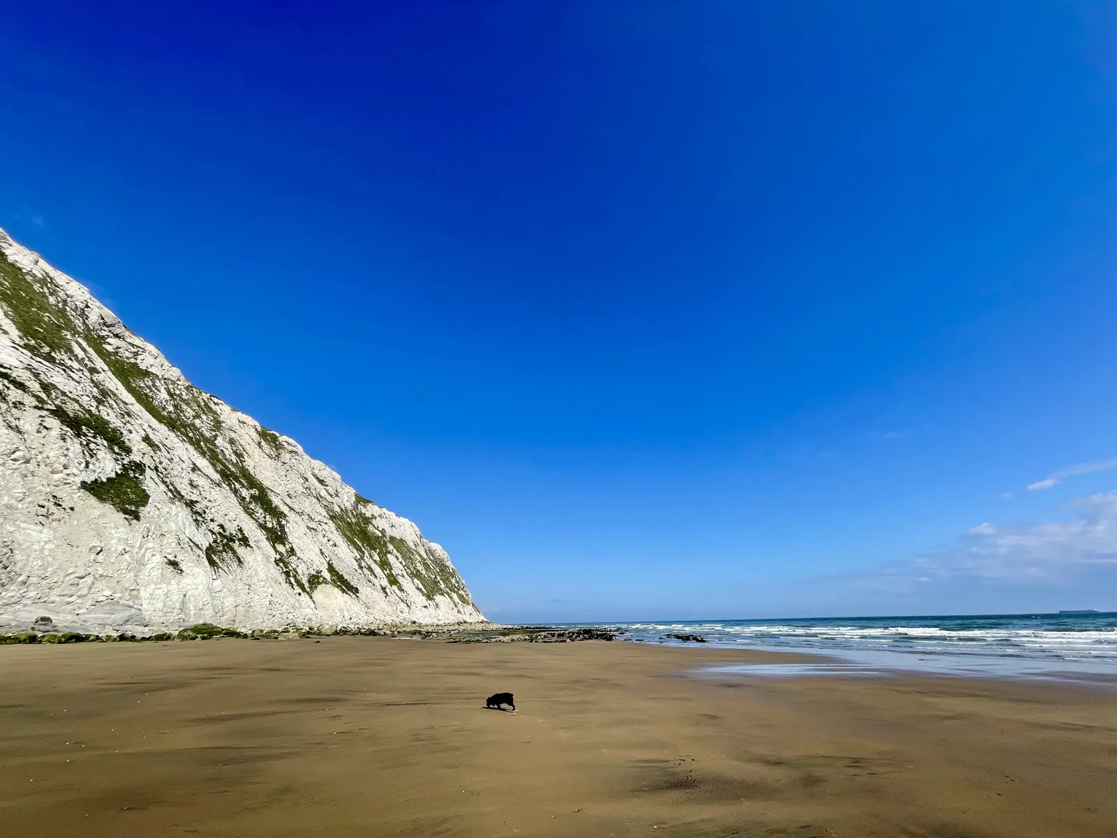 White chalk cliff of Culver above Yaverland beach on a clear day
